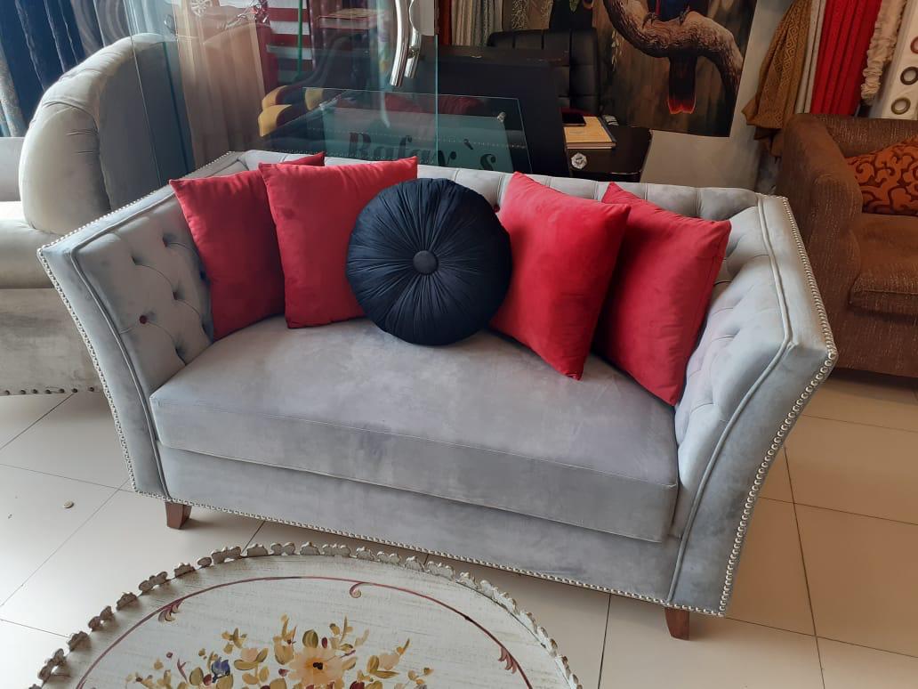 Modern Contrast – Grey Couch with Red Cushions - Rafay's Interior