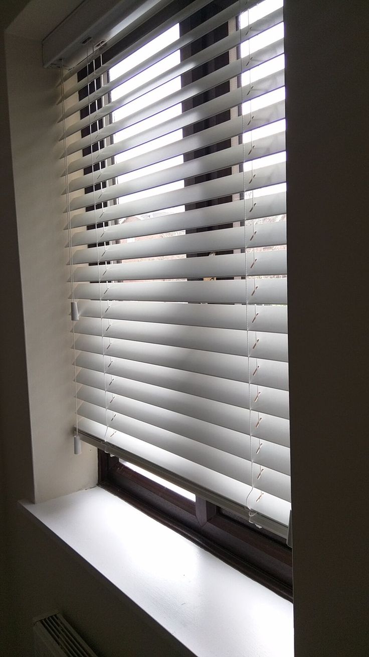 Elegant White Shade Blinds - Rafay's Interior